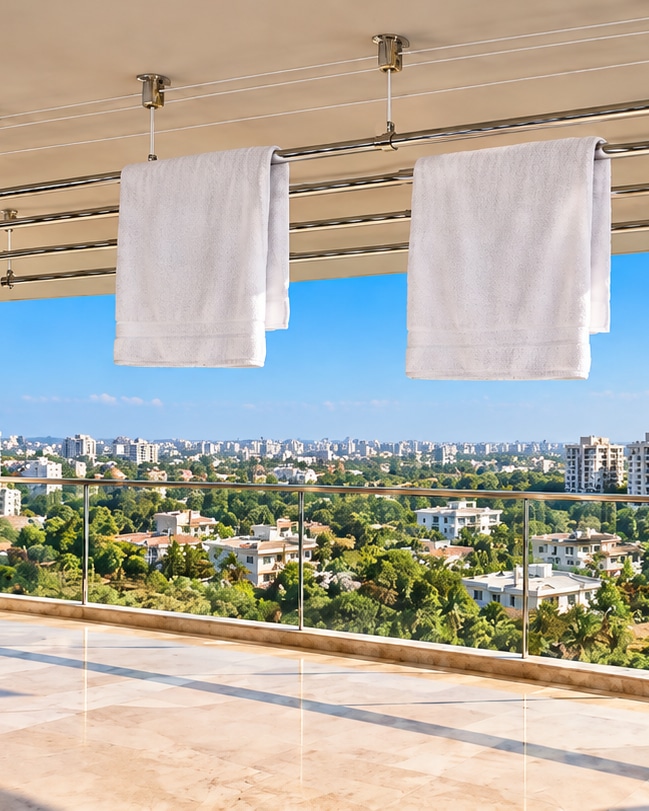 Ceiling-mounted cloth drying hanger in a bright apartment balcony